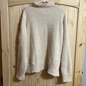 Cream sweater